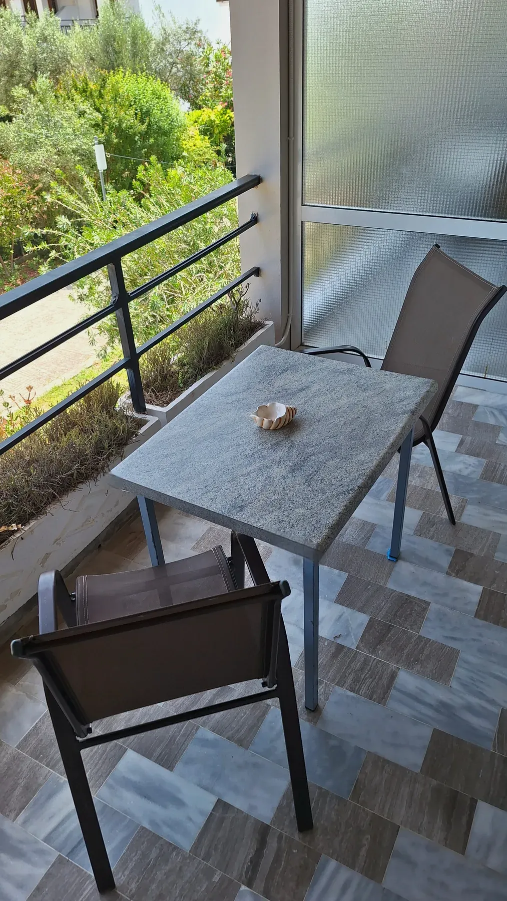 Balcony overlooking the garden in Apartment 7 at Antzela Apartments