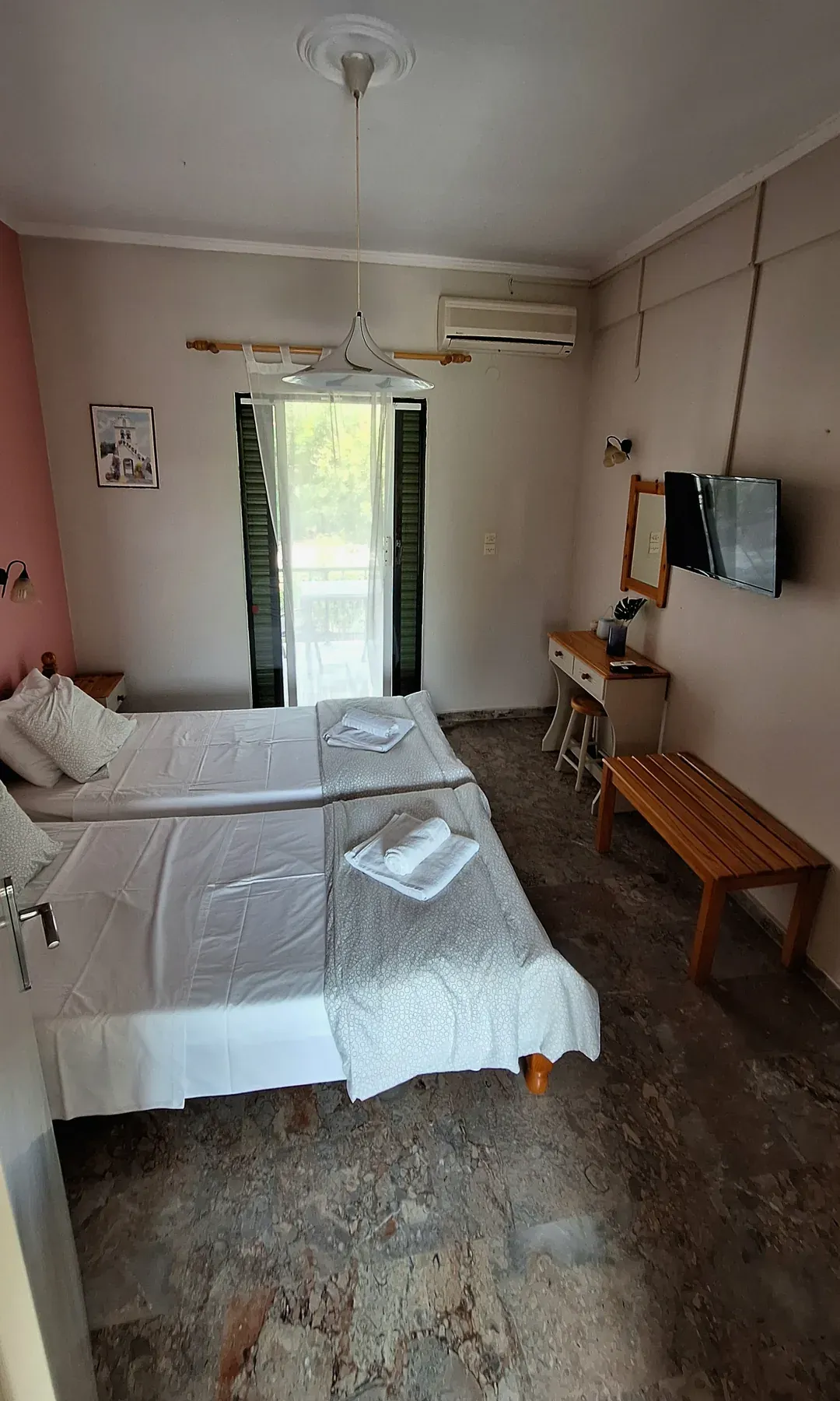 Wide view of the sleeping area in Apartment 2 at Antzela Apartments