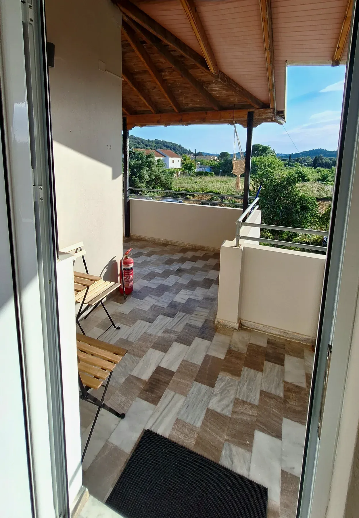 Covered balcony in Apartment 6 at Antzela Apartments