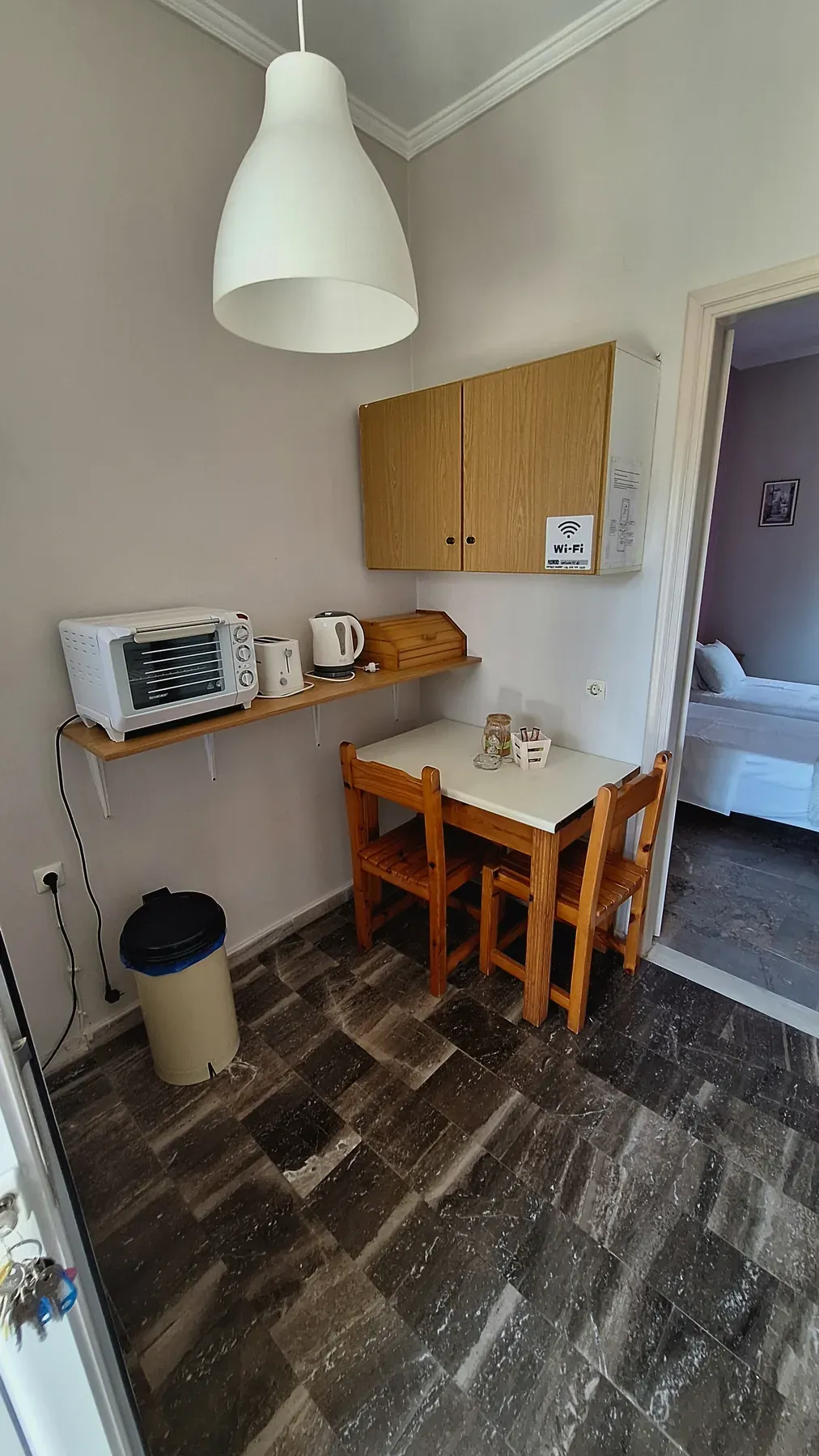 Kitchen and dining area in Apartment 5 at Antzela Apartments